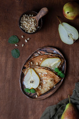 thin crepes with caramel pear and pine nuts