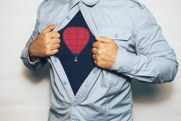 Business man in shirt with a picture  balloon. White Background.