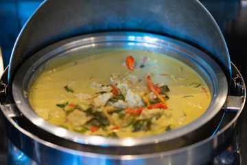 Thai food, Thai chicken green curry in stainless pot 