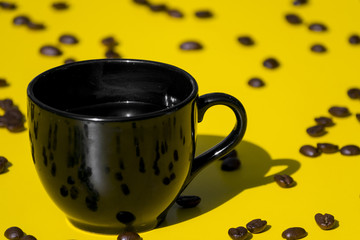 Empty cup of coffee with grains