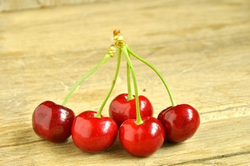 cherries on wooden background