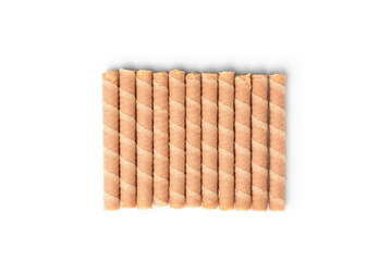 Sweet chocolate waffle rolls isolated on white background.