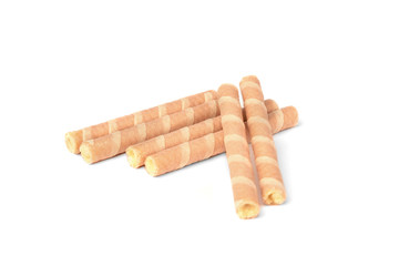 Sweet chocolate waffle rolls isolated on white background.