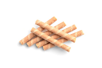 Sweet chocolate waffle rolls isolated on white background.