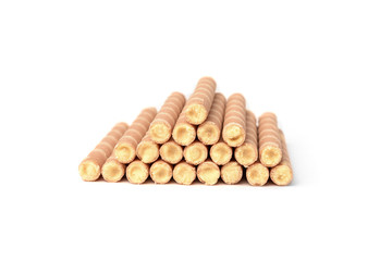 Sweet chocolate waffle rolls isolated on white background.