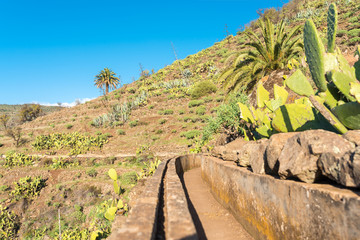 Irrigation canal for watering terraced fields in the Barranco de Argaga, the Argaga canyon on the island of La Gomera