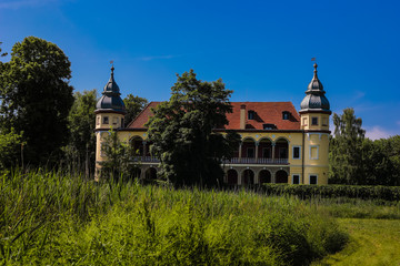 Fototapeta na wymiar HDR Photo of Palace in Krobielowice, Poland. XVI Century Renaissance Palace with Old Gate. 