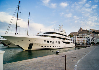 Naklejka premium Amazing luxury yacht in the old tow of Ibiza, Spain