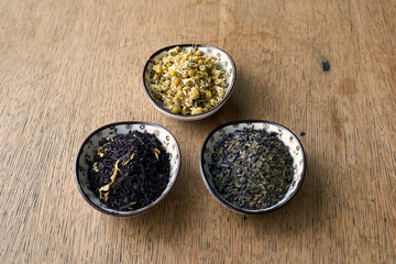 Earl Grey and Chamomile tea on a wooden table 