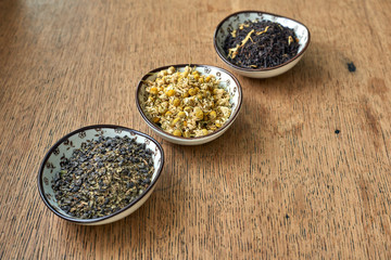 Earl Grey and Chamomile tea on a wooden table 