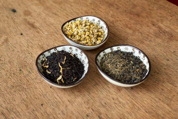 Earl Grey and Chamomile tea on a wooden table 