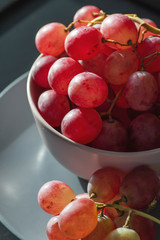 Red grapes on a bowl