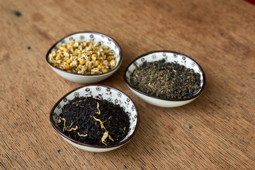 Earl Grey and Chamomile tea on a wooden table 