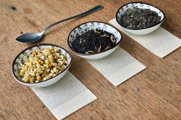 Earl Grey and Chamomile tea on a wooden table 
