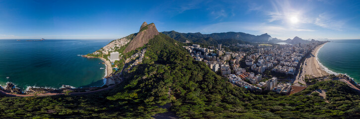 Sunrise 360 degree full panoramic aerial view of Two Brothers mountain and Leblon beach and...