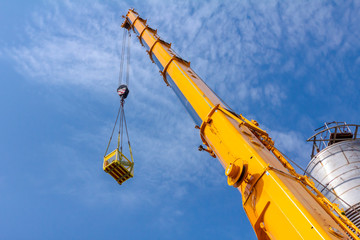 Crane is lifting work basket