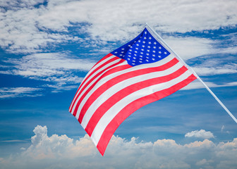 the flag american in blue sky