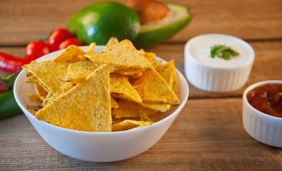 Mexican corn chips nachos with salsa dip