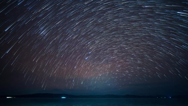 Time lapse startrails on a dark sky , nightscape near seascape , Lockdown.