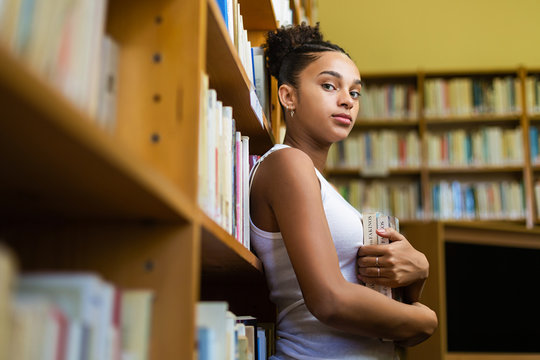 Black african american young girl student studying at the school university library