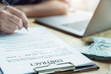 Show the form of signing a contract for trading or showing a loan agreement.