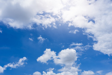 Naklejka na ściany i meble White cloud in the blue sky in sunny day.