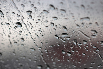 Drops of condensate on the surface of a plastic bottle, close-up