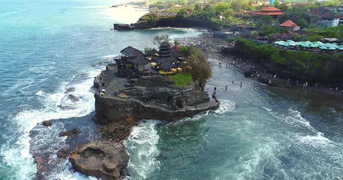 AERIAL: Tanah Lot - Temple in the Ocean. Bali, Indonesia. 