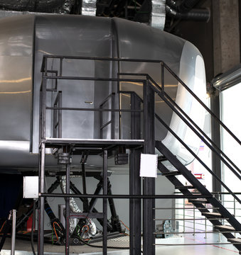 Appearance of a training simulator of a passenger plane cabin for training and instructing pilots and other trainees