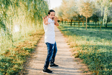 Fototapeta premium Funny italian man posing at nature.