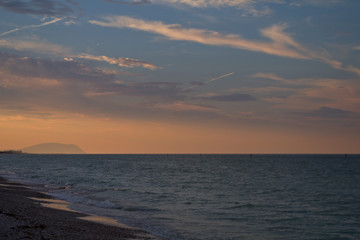 Fototapeta na wymiar sunset over the sea,Adriatic cea,Italy,seascape,nature,clouds,horizon,coast, beautiful,orange,waves, evening, 