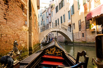 View of the Grand Canal from a gondola in Venice, Italy.