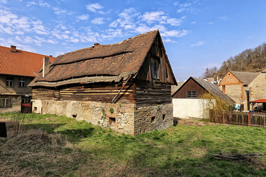 Old timbered barn with stone bases