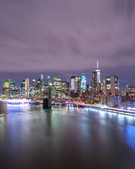 Fototapeta premium Aerial night view on FDR ,Brooklyn Bridge and Financial District with long exposure