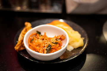 Kimchi, Korean fermented vegetable in white bow ready to eat, Korean food