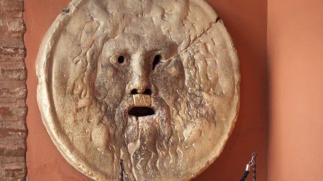 Close up of Mouth of Truth or Bocca della Verita in Rome, Italy. The attraction in Basilica of Saint Mary in Cosmedin
