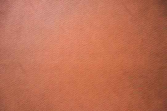 textured background of terracotta color
