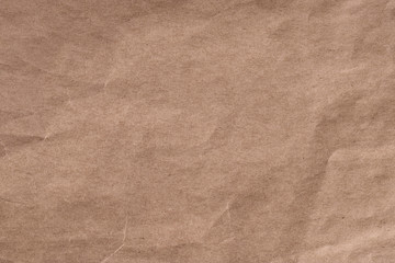 Beige crumpled paper for background
