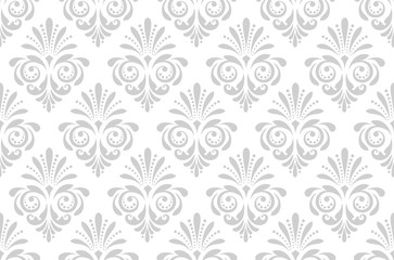 Wallpaper in the style of Baroque. Seamless vector background. White and grey floral ornament. Graphic pattern for fabric, wallpaper, packaging. Ornate Damask flower ornament.