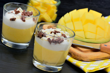 Pudding of mango in a glasses jars