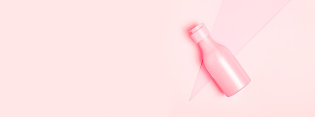Creative minimal beauty and health background with pink bottle. Minimal top view and flat lay of cosmetic on pink and blue trendy background.