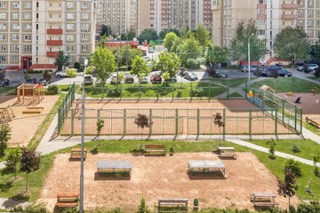Aerial view playground workout place for sport and house building exterior mixed-use urban multi-family community residential district area development
