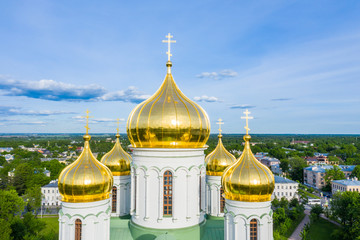 Aerial view of the Orthodox church, cathedral with golden crosses and domes in the city of Pushkin....