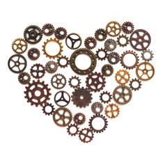 The heart of the gears of bronze, silver, gold and copper shades of different diameters and type on a white background..