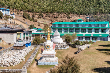 Namche Bazaar, Nepal - October 27, 2018: Trekker entering Sherpa Culture Museum in Chogang Namche Bazaar in Nepal.