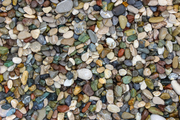 small stones on  pebble beach, background