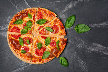 Pizza margarita with tomato, cheese and basil