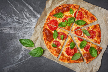 Pizza margarita with tomato, cheese and basil
