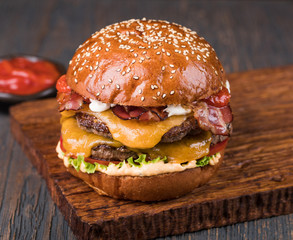 Burger on a wooden board