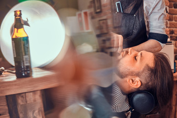 Brutal man just got good beardcare from talanted trendy barber.
